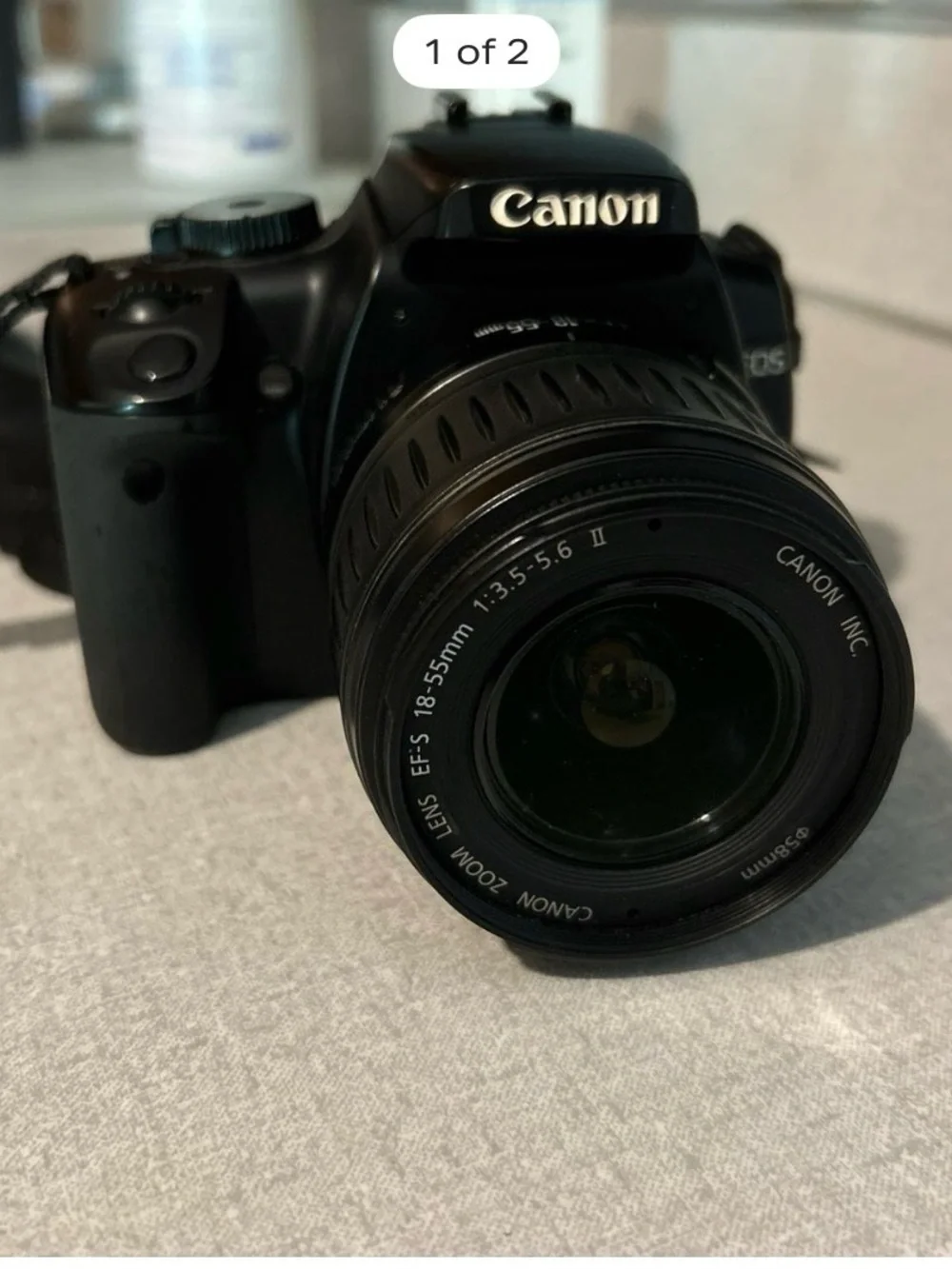 Canon Black DSLR with 18-55mm Zoom Lens